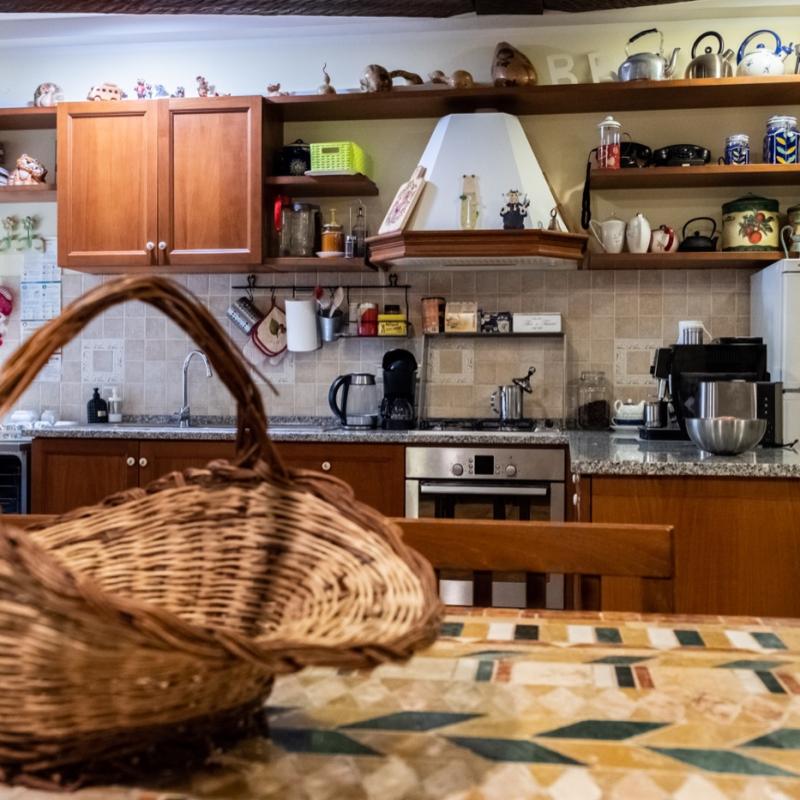 The warm and welcoming rustic cucina and sala colazione area at C'era una volta B&B.