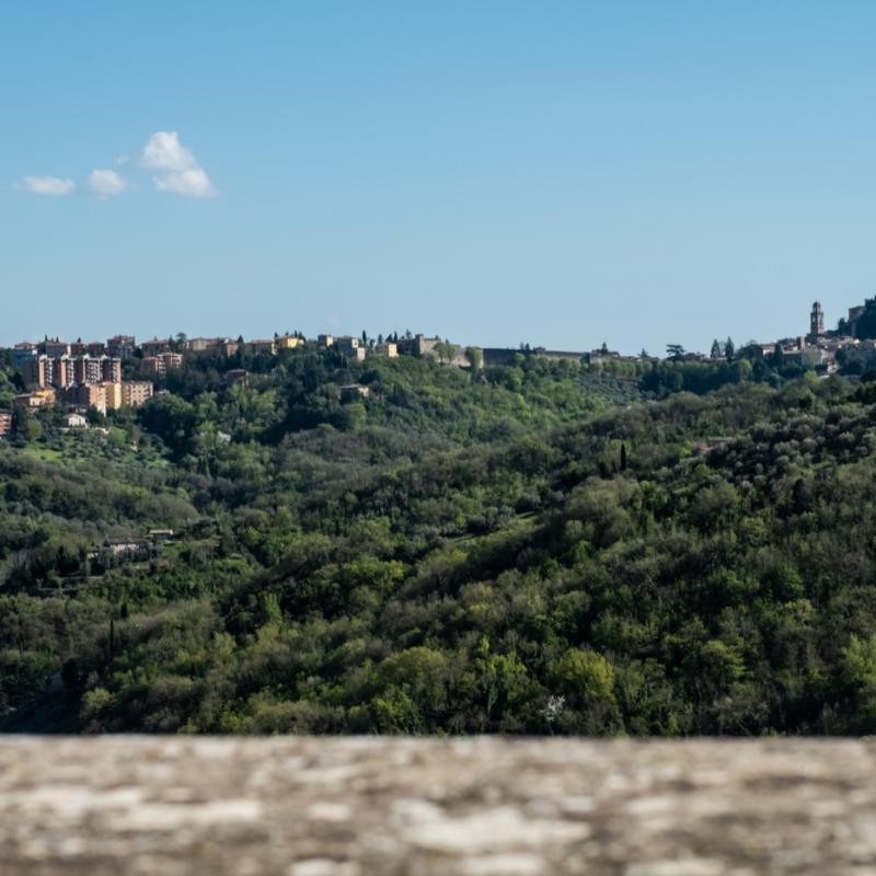 The private panoramic terrace of the Papavero (Poppy) Room at B&B C'era una volta, offering stunning views over Perugia and Assisi.